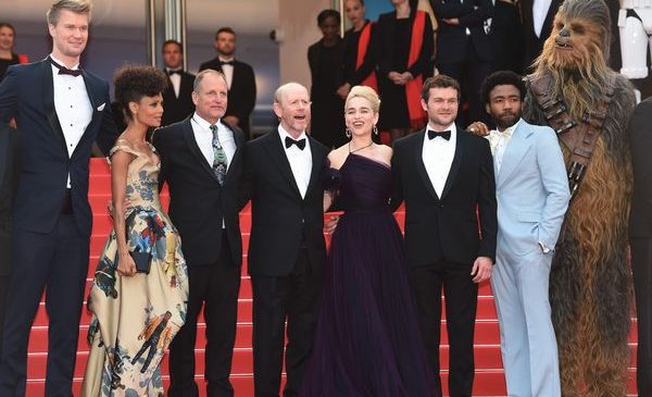 CANNES, FRANCE - MAY 15:  (L-R)  Producer Simon Emanuel, actor Joonas Suotamo, actress Thandie Newton, actor Woody Harrelson, director Ron Howard, actress Emilia Clarke, actor Alden Ehrenreich, actor Donald Glover and Chewbacca attend the European Premiere of 'Solo: A Star Wars Story' at Palais des Festivals on May 15, 2018 in Cannes, France.  (Photo by Antony Jones/Getty Images for Disney) *** Local Caption *** Simon Emanuel;Joonas Suotamo;Thandie Newton;Woody Harrelson;Ron Howard;Emilia Clarke;Alden Ehrenreich;Donald Glover;Chewbacca